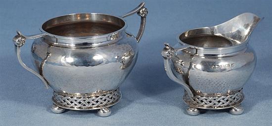 A Georged V silver Arts & Crafts three piece tea set,